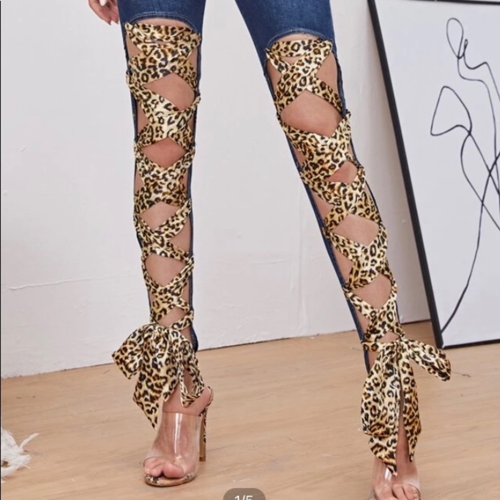 new, never worn leopard tie detail jeans